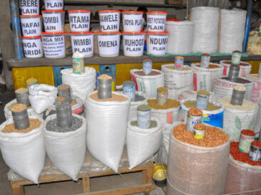 Assorted grains and processed agricultural products displayed in a local market in Nakuru, Kenya, illustrating rural agricultural value chains in action.